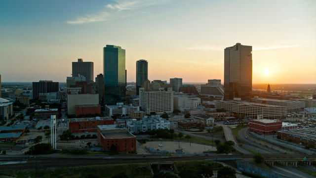 Sun Setting Behind Fort Worth Skyline - Aerial 