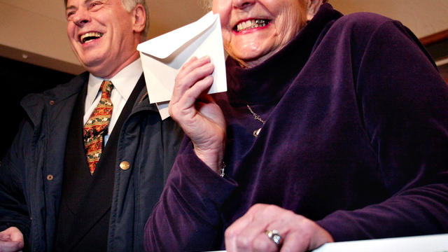 February 3, 2002. Marcella Longnecker of Arden Hills, MN reacts to the announcement that she had just won over $10 million dollars in Publishers Clearing House prize money.  At left is David Sayer, a representative of Publishers Clearing House, who made t 