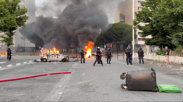 France arrests 180 in second night of violent protests over police killing of teen Nahel in Nanterre - CBS News