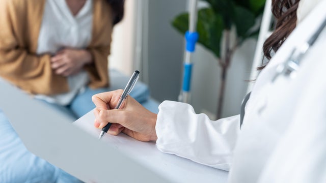 Patient with stomach pain at a doctor's appointment