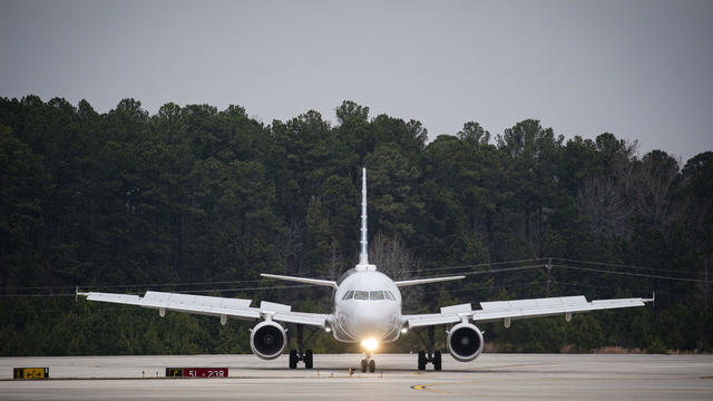 Travelers At Raleigh-Durham Airport As Aviation Turmoil Reduced By Latest 5G Accord 