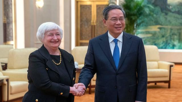 U.S. Treasury chief warns China against "unfair economic practices"
