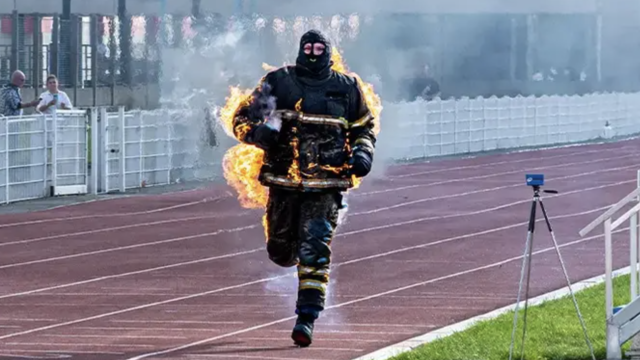 Firefighter sets record for longest run while set on fire