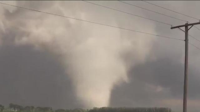 Tornadoes touch down in Chicago area, grounding flights and wrecking homes