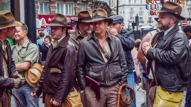 Indiana Jones fans dressed as their hero gather ahead of the 