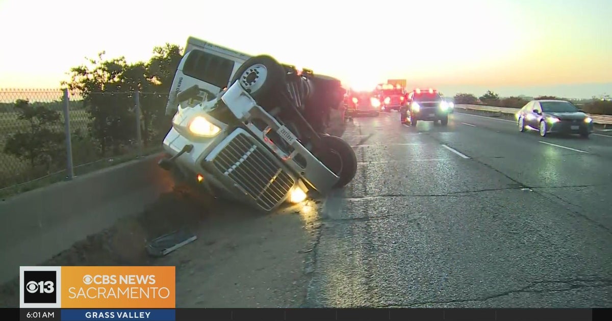 Overturned semi causing big traffic backup on WB I-80