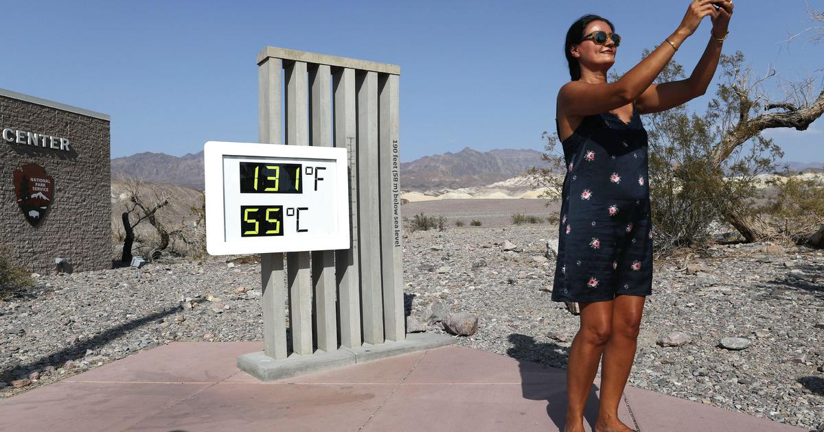 Tourists flock to Death Valley to experience near-record heatwave