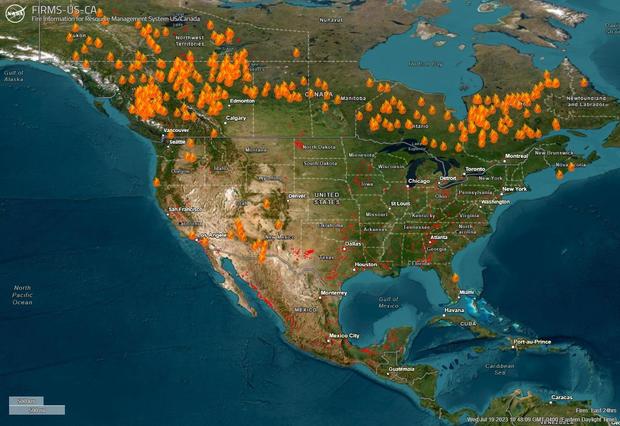 An image capture from the Fire Information for Resource Management System US/Canada shows active fires in the U.S. and Canada as of July 19, 2023. 