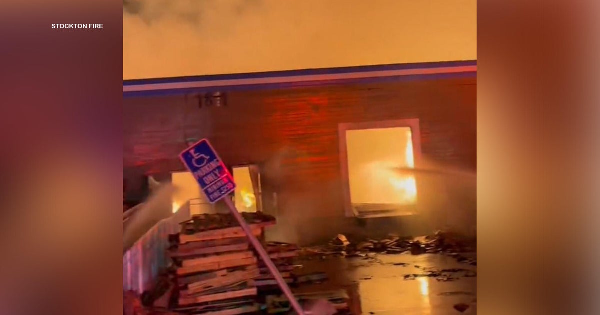 Stockton church, child care agency building saved from flames after 5-alarm fire at warehouse next door