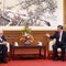 Xi and old friend Henry Kissinger discuss mending U.S.-China ties