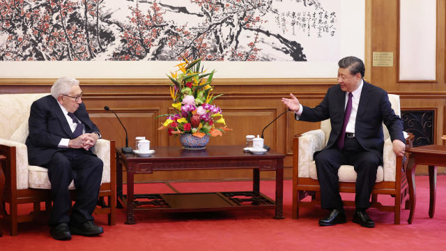 Chinese President Xi Jinping and Henry Kissinger, former U.S. secretary of state, attend a meeting in Beijing 