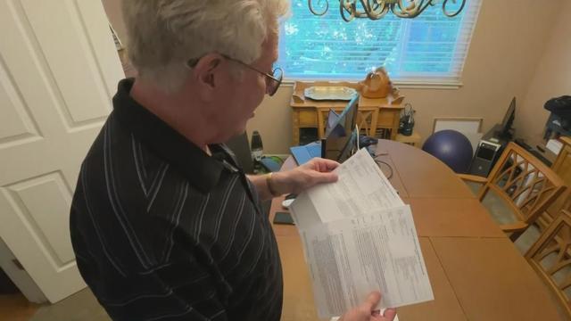 A Menlo Park homeowner looks at a notice of non-renewal from his insurance company 