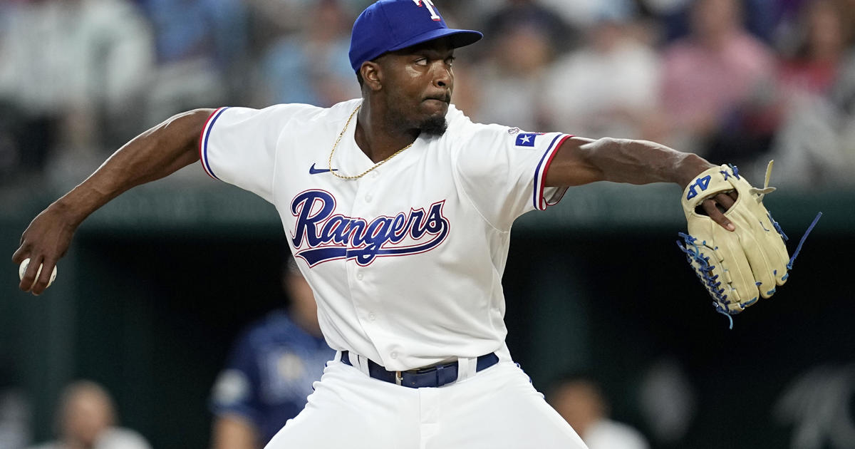 Rangers back on top of AL West after 8-5 win in opener over
