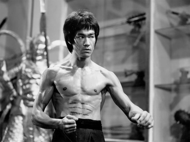 Actor and martial artist Bruce Lee poses for a Warner Bros. publicity still for the film "Enter the Dragon" in 1973 in Hong Kong. 