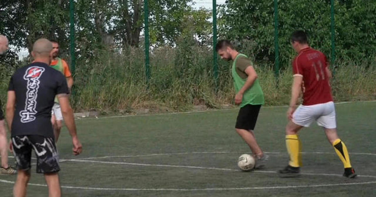 Ukrainian soldiers play soccer just miles from the front line as grueling counteroffensive continues