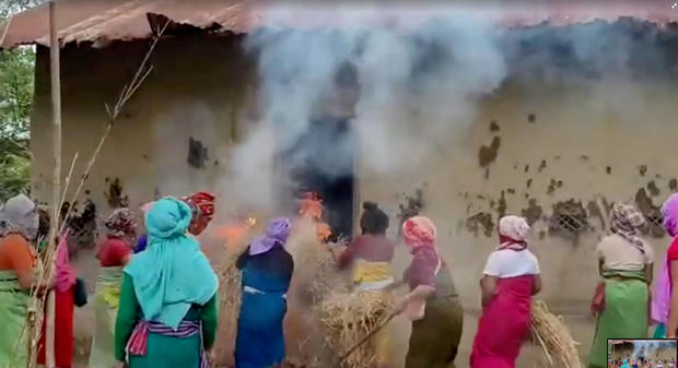 Women put burning hays in the house of the accused in viral Manipur video case, in Manipur 