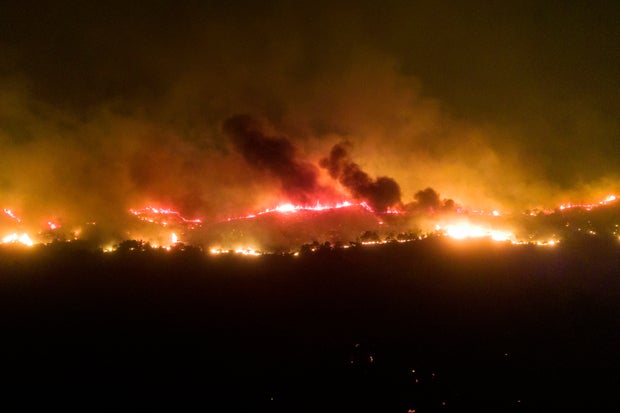 Greek authorities arrest 2 for arson as wildfires across the country continue to burn