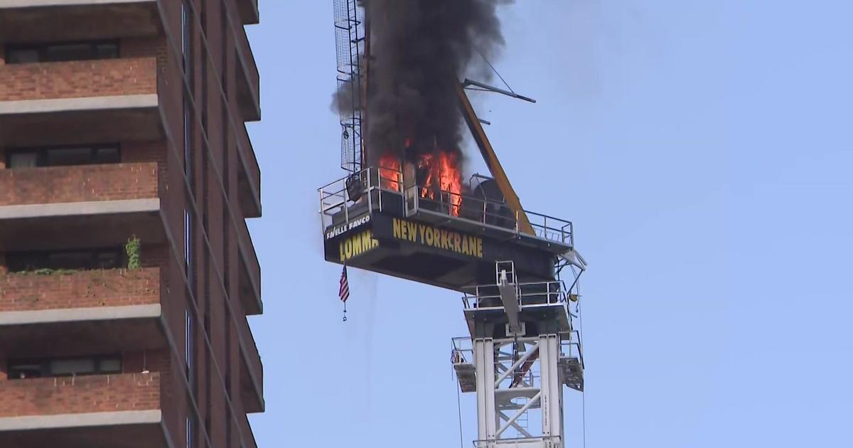12 hurt when crane arm catches fire, collapses onto NYC street during morning commute