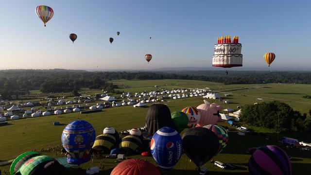 Hot air balloons launch during the 40th annual New Jersey Lottery Festival of Ballooning at Solberg Airport in Readington, New Jersey, on July 28, 2023. 