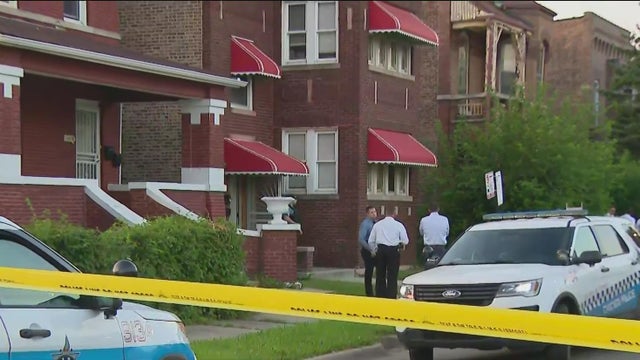 Red and blue police lights in city 