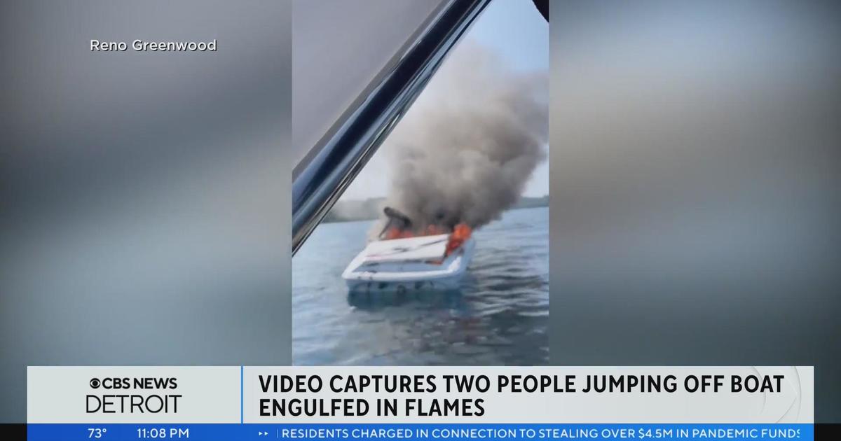 Video captures 2 people jumping off boat engulfed in flames in Grand Traverse Bay