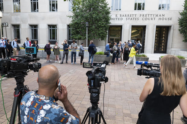 Journalists line up to enter the E. Barrett Prettyman Courthouse on Aug. 3, 2023, in Washington, D.C. 
