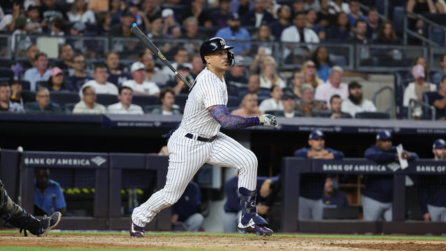 Giancarlo Stanton #27 of the New York Yankees singles in a run in the seventh inning against the Tampa Bay Rays during their game at Yankee Stadium on August 2, 2023 in Bronx borough of New York City. 