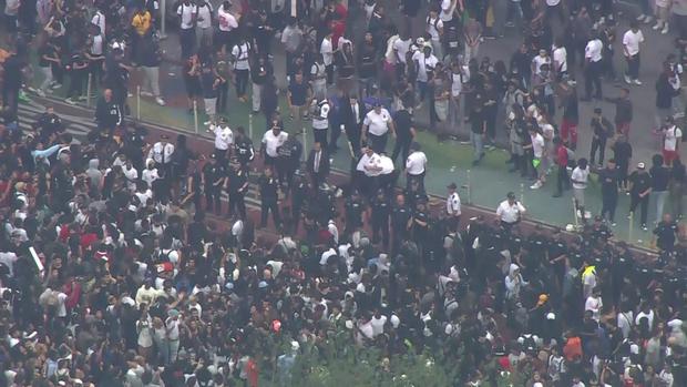 An aerial view of a line of NYPD officers as thousands of people crowded into Union Square. 