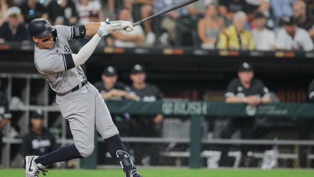 New York Yankees right fielder Aaron Judge (99) hits swings and hits a home run in the eighth inning during a Major League Baseball game between the New York Yankees and the Chicago White Sox on August 8, 2023 at Guaranteed Rate Field in Chicago, IL. 