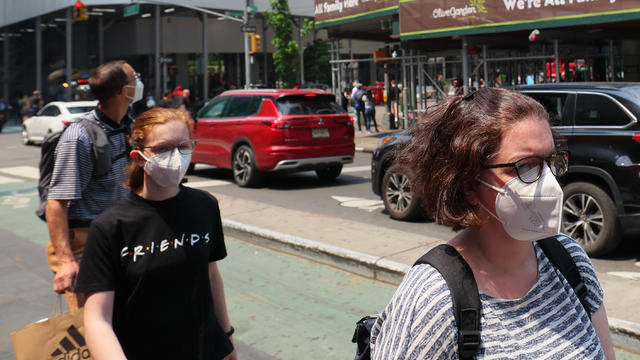 File photo of people wearing masks in New York City. 
