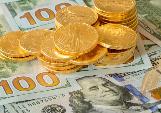 US dollar bills and coins background