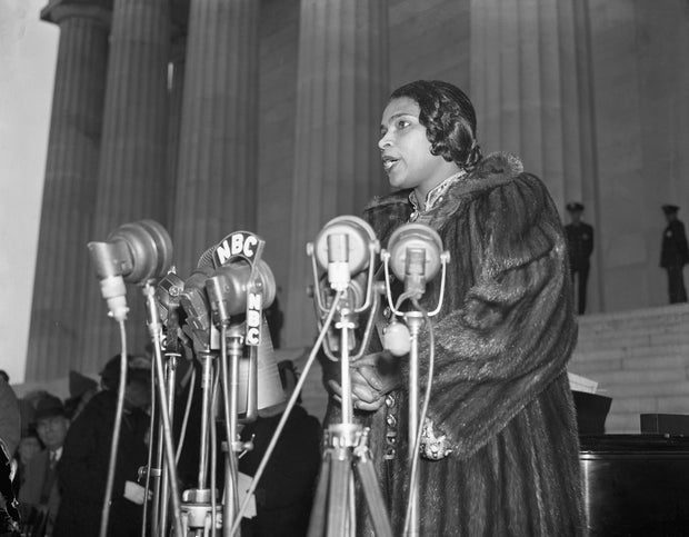 Marian Anderson singing on the steps of the Lincoln Memorial at the Easter Sunday Open Air concert in 1939.