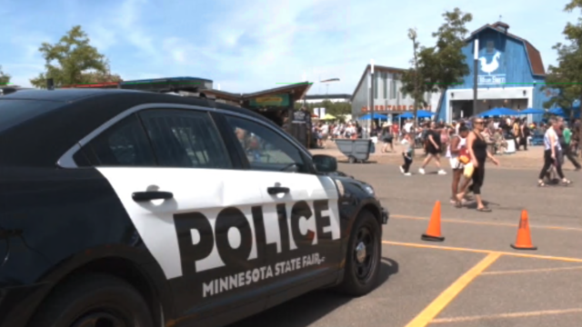 minnesota state fair police car outside the blue barn 