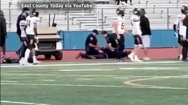 Ex-Teacher Tackled at High School Football Game 