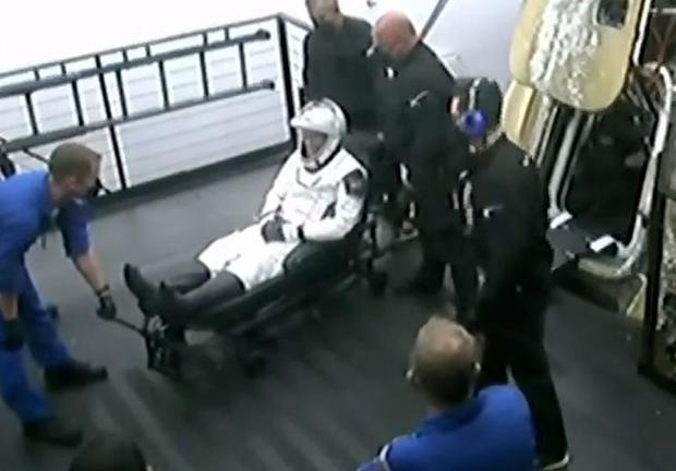 crew-dragon-commander-stephen-bowen-is-helped-out-of-the-spacecraft-after-spacex-return-flite-to-earth-from-spaced-station-very-early-on-090423.jpg 
