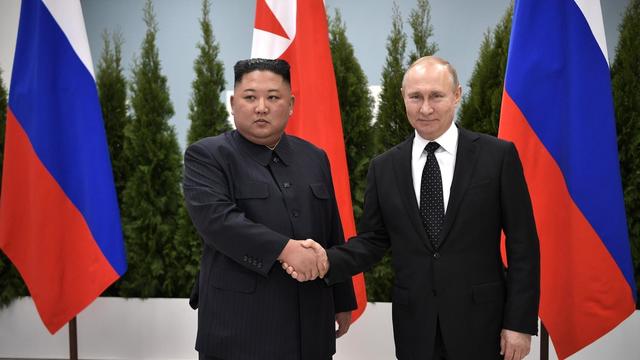 FILE PHOTO: Russian President Vladimir Putin and North Korea's leader Kim Jong Un pose for a photo during their meeting in Vladivostok 
