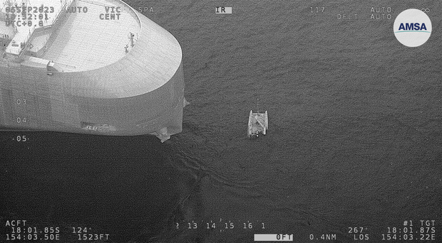Three sailors fwere rescued on Wednesday after their boat came under attack from sharks, authorities said