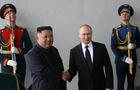 FILE PHOTO: Russian President Vladimir Putin and North Korea's leader Kim Jong Un pose for a photo during their meeting in Vladivostok 