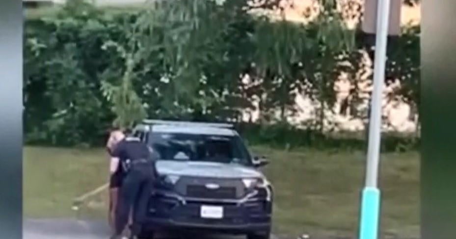 Wife responds to viral video of Maryland officer kissing female, getting into patrol car or truck