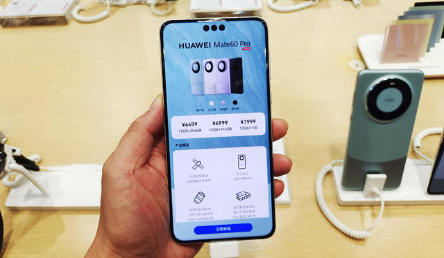 Huawei is releasing a faster phone to compete with Apple. Here's why the U.S. is worried. - CBS News
