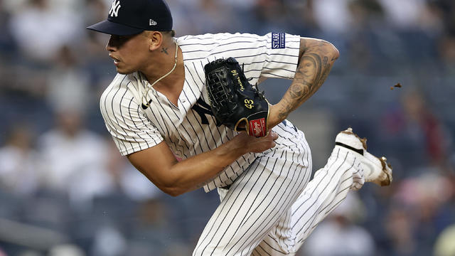 New York Yankees pitcher Jonathan Loaisiga (43) pitches against the Milwaukee Brewers during the eighth inning of a baseball game Saturday, Sept. 9, 2023, in New York. 