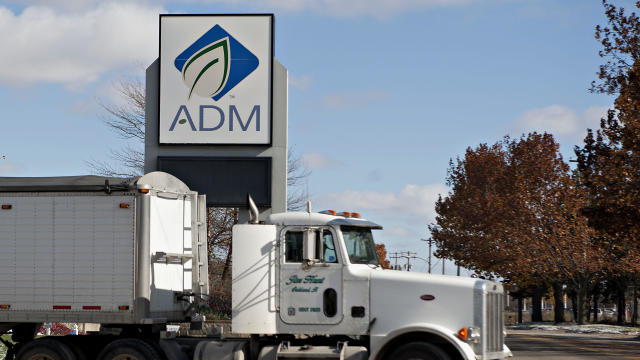 A grain truck exits the campus of the Archer Daniels Midland Co. headquarters and the Decatur Corn Plant in Decatur, Illinois, on Nov. 12, 2013. 