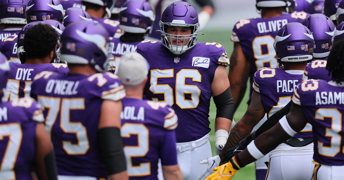 Minnesota Vikings center Garrett Bradbury (56) runs off the field