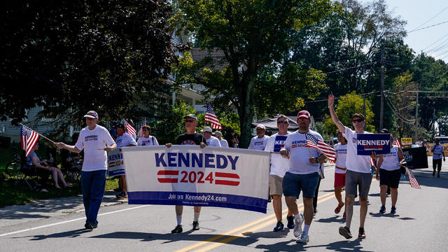 Supporters of Democratic presidential candidate Robert F. Kennedy Jr. participate in the Milford Labor Day Parade 