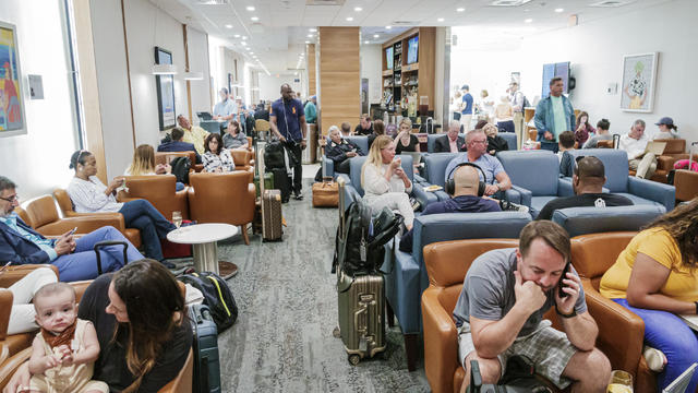 Florida, Fort Lauderdale, Delta Sky Club, busy crowded passenger lounge 