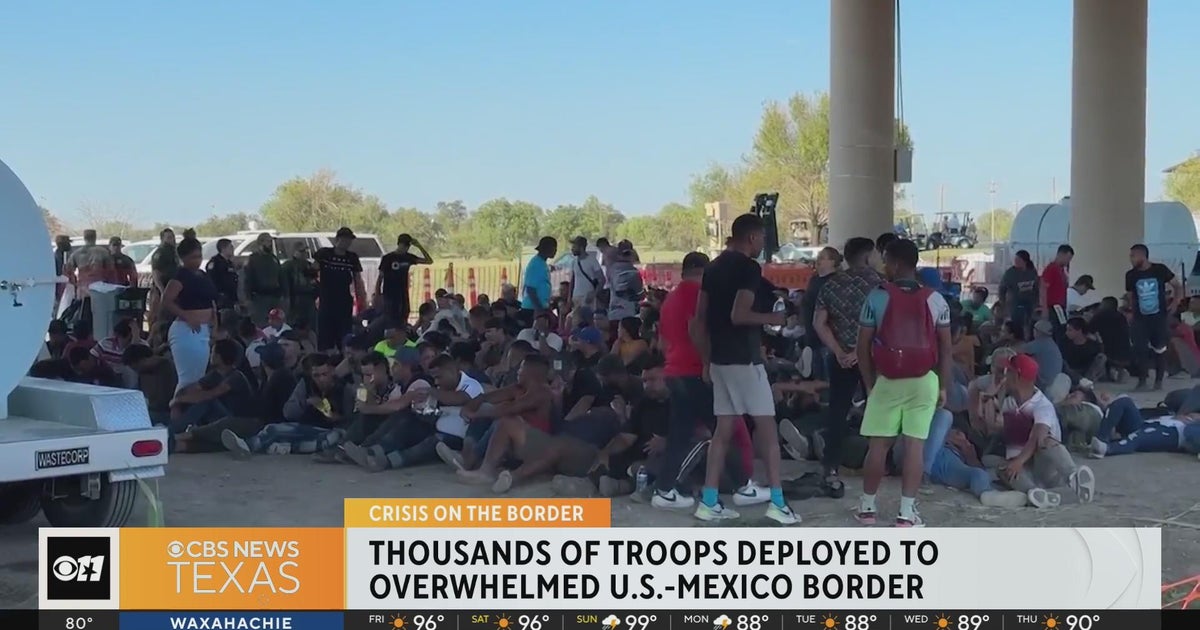 Troops deployed to Eagle Pass as migrants flood across the Rio Grande ...