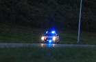Illuminated police car lights and sirens 