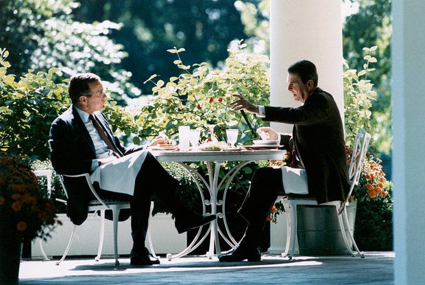 President Ronald Reagan having lunch with Vice President George Bush at the White House on Oct. 4, 1984.