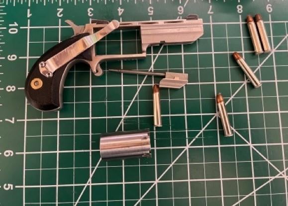 Man "blamed his wife" after loaded gun found in carry-on bag at Reagan ...