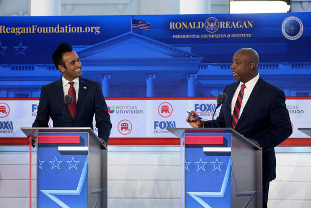 Vivek Ramaswamy and Sen. Tim Scott participate in the second Republican primary debate at the Ronald Reagan Presidential Library on Sept. 27, 2023, in Simi Valley, California. 